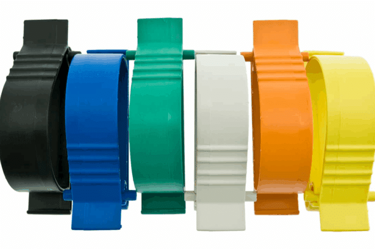 A collection of five colorful plastic clips displayed together, featured as the Utility Catcher® multipurpose clip.