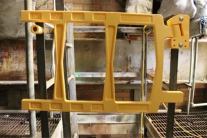 An OSHA-compliant safety gate in a well-lit area.