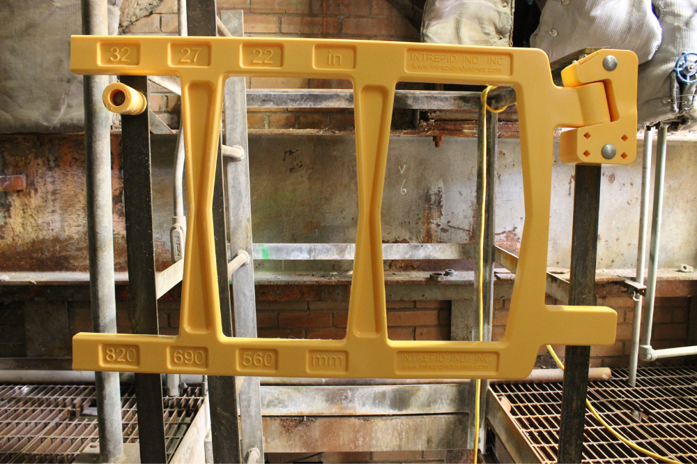 An OSHA-compliant safety gate in a well-lit area.